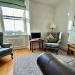 Perfectly Located, Central Bowness Flat With Free Parking And Lake Views