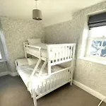 Perfectly Located, Central Bowness Flat With Free Parking And Lake Views